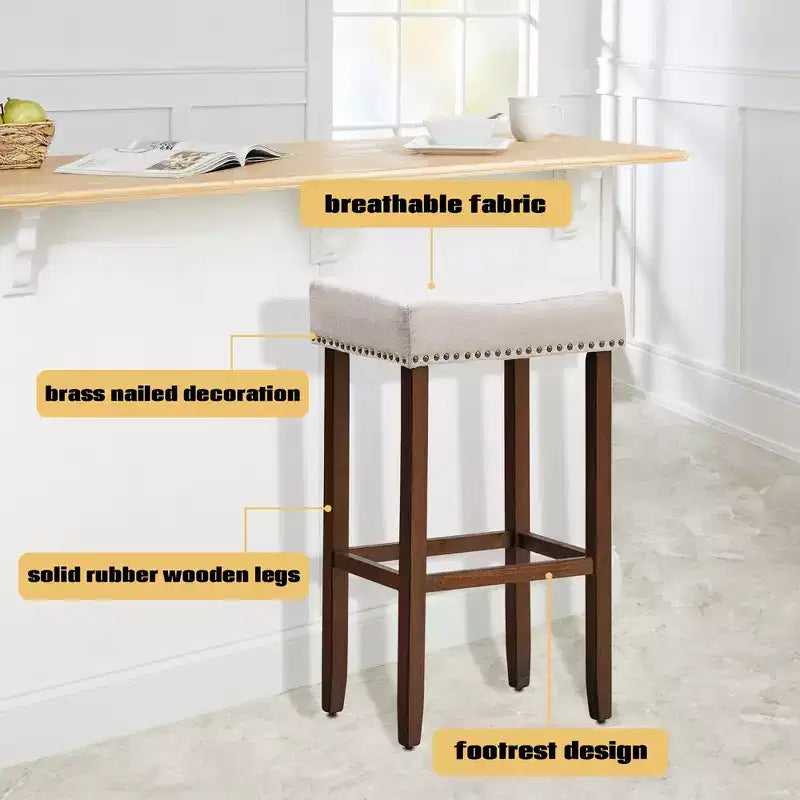 Lot de 4 tabourets de bar à selles avec clous décoratifs – Hauteur 73,7 cm – Assise en tissu et pieds en bois gris/beige